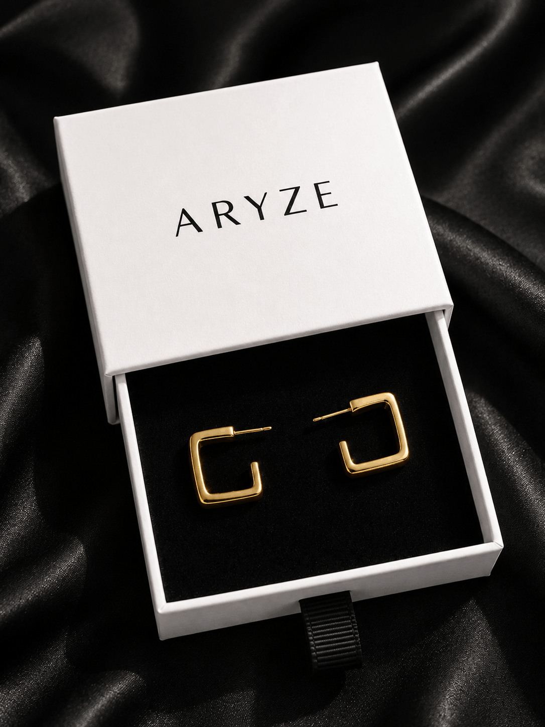 Modern Muse gold-tone square hoop earrings presented in the branded Aryze gift box