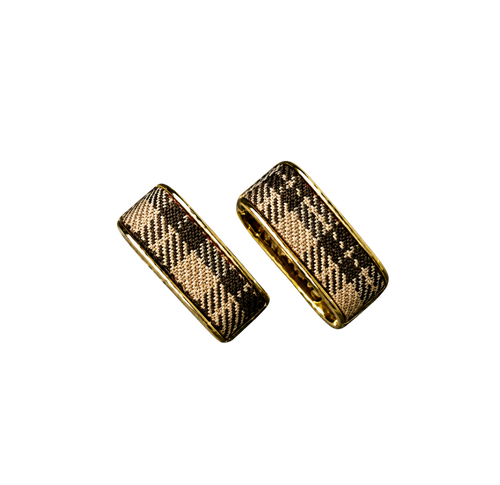Check Luxe gold-tone wide hoop earrings with woven check pattern on a black background
