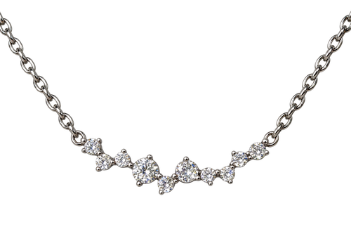 Celeste Glow silver-tone cubic zirconia cluster necklace on a black background